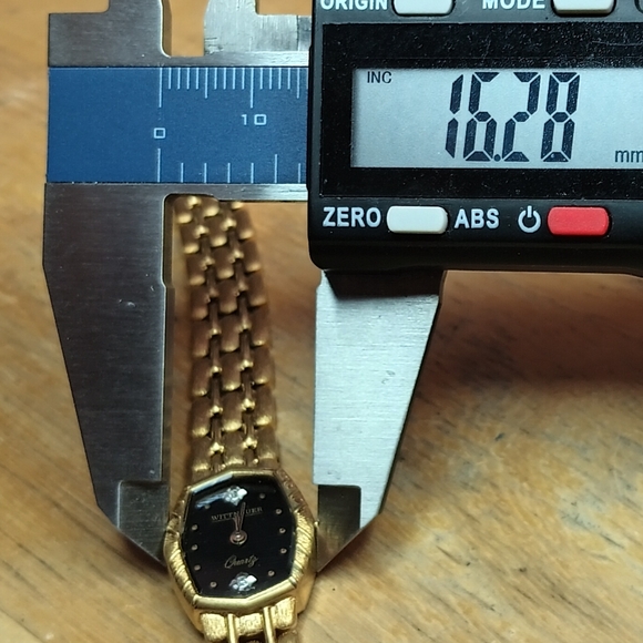 X Ladies gold plated watch, band black dial 2 hand movement diamond at 12 - Picture 5 of 9